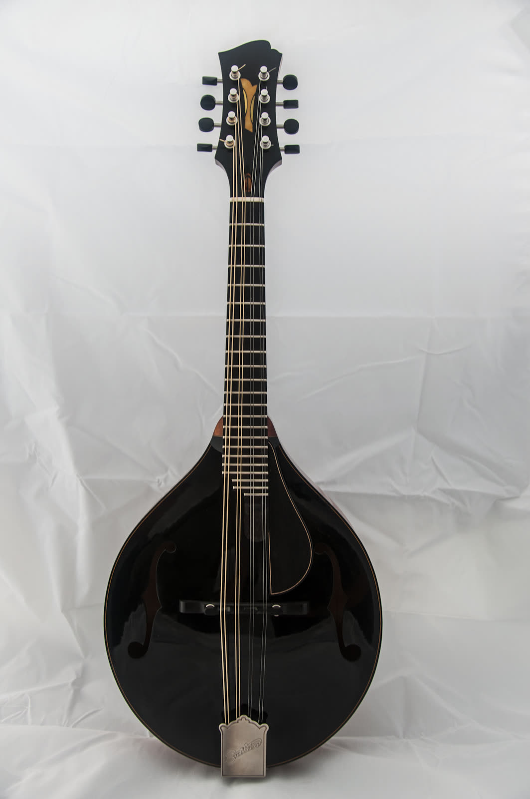 A-model mandolin — top, black lacquer, straight-on view
