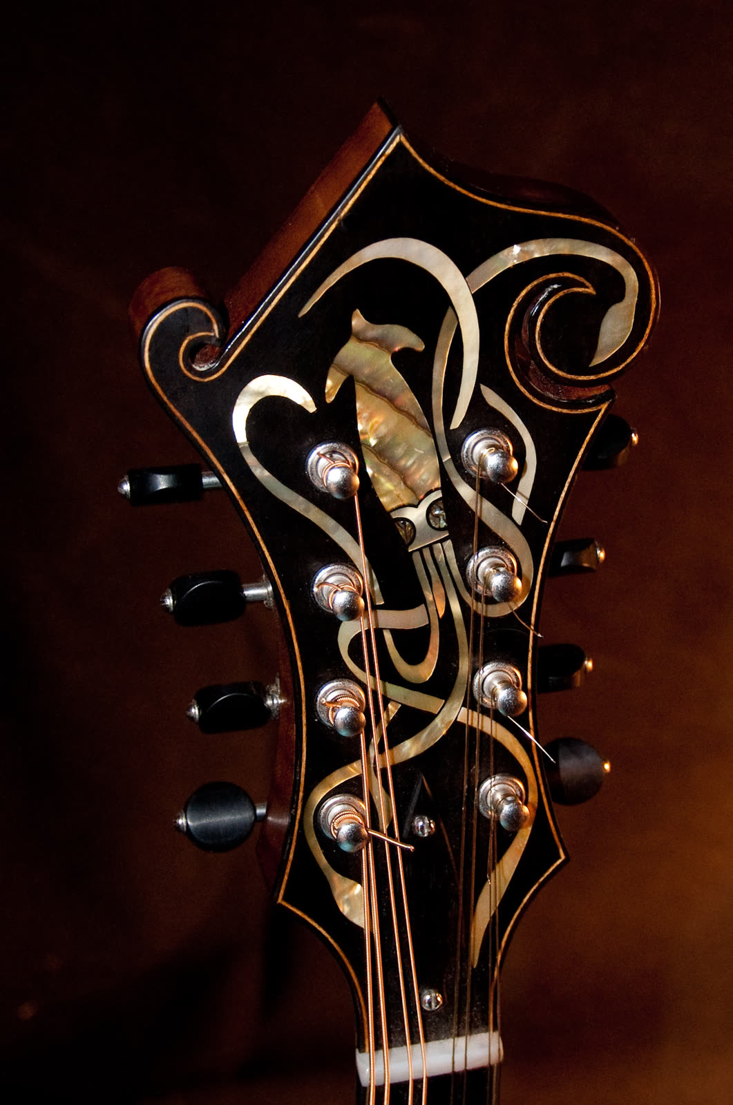 F-model mandolin, peghead, ebony, pearl, abalone